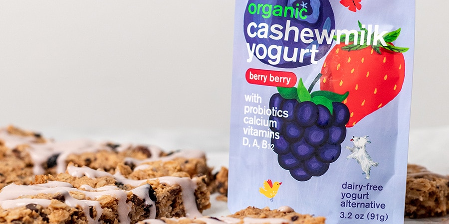 Berry Berry Cashewmilk Yogurt pouch with homemade yogurt granola bars.