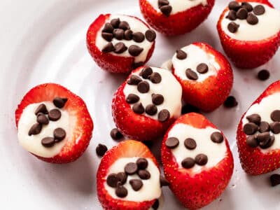Strawberries filled with yogurt and mini vegan chocolate chips.