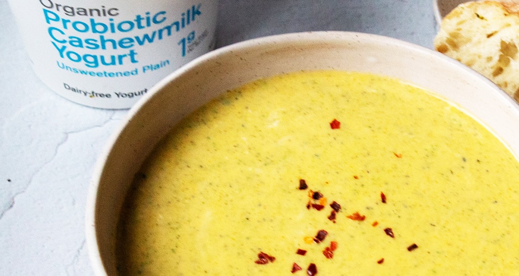 Close up view of a bowl of Creamy Broccoli soup.